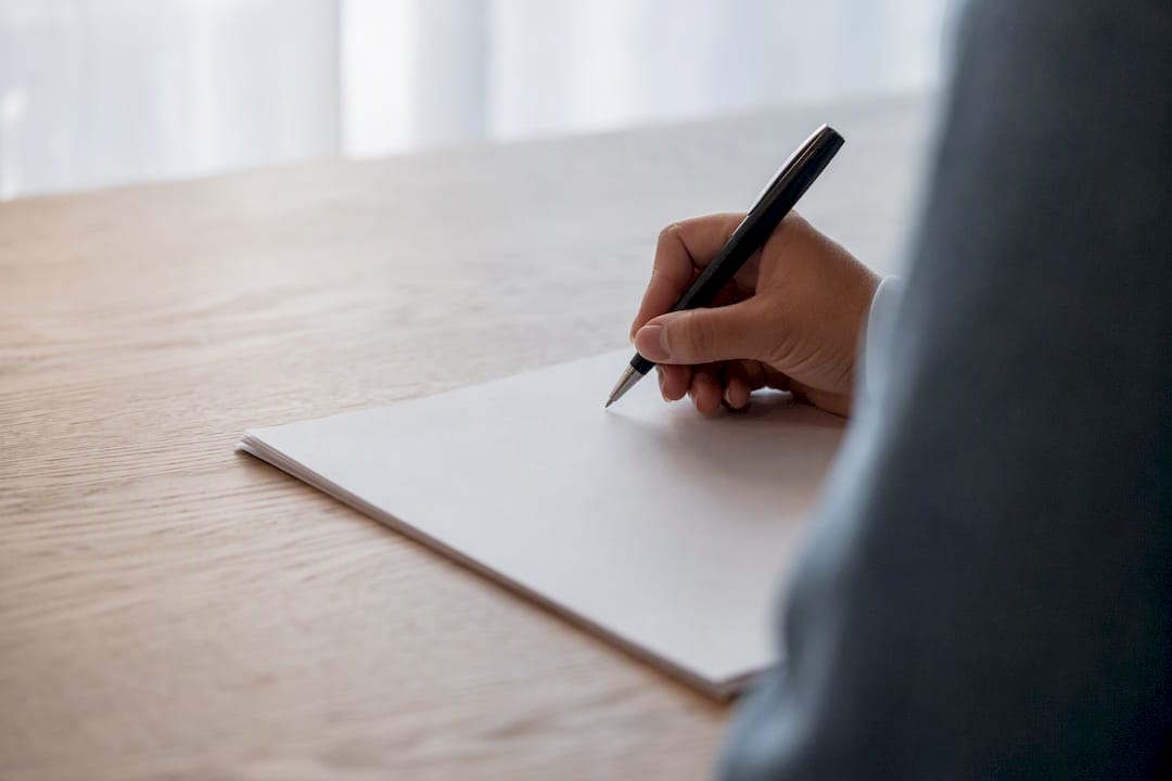 Hand signing blank contract paper